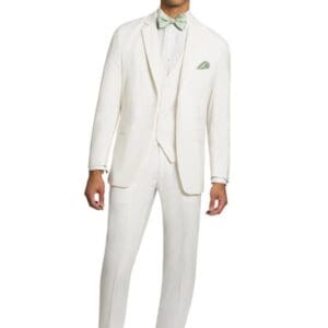 A man in white suit and green bow tie.