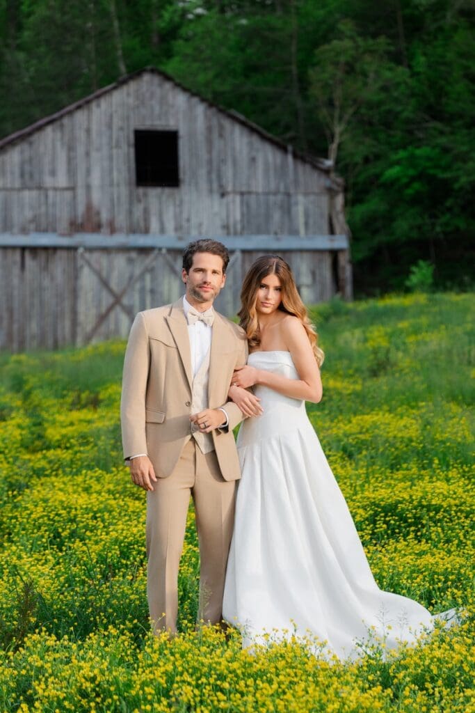 Bride and groom in yellow flower field